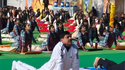 MP CM Mohan Yadav participates in mass Surya Namaskar program (Photo/ANI)