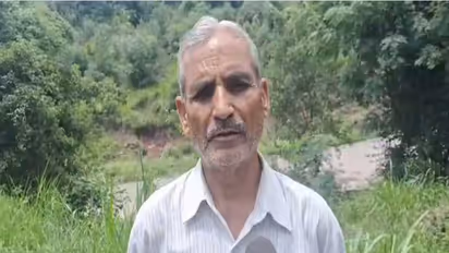 Flash floods triggered by heavy rainfall washes away crops and farmland in Rajouri, Jammu and Kashmir