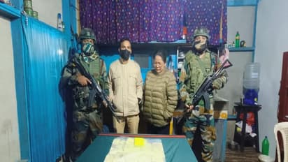 Assam Rifles Personnel with recovered Methamphetamine Tablets and Trafficker Zolianthangi (Photo/Assam Rifles)