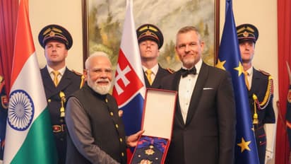 PM Narendra Modi being conferred The Order of the White Double Cross (1st Class), (Photo/X/@rajnathsingh)