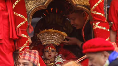 The newly anointed living goddess Kumari, Aryatara Shakya, participates in a five-day tour around Kathmandu on a chariot during the Indra Jatra festival (Photo/ANI)
