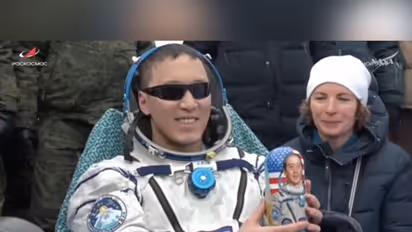 NASA astronaut Jonny Kim shows off the Matroyshka (stacking) doll he received upon his return to Earth (Photo/NASA)