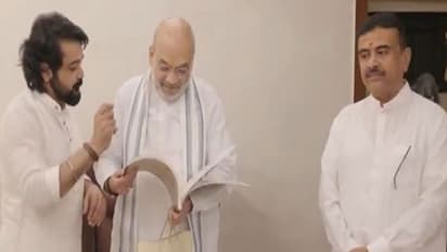 Union Home Minister Amit Shah and actor Prosenjit Chatterjee (Photo/ANI)