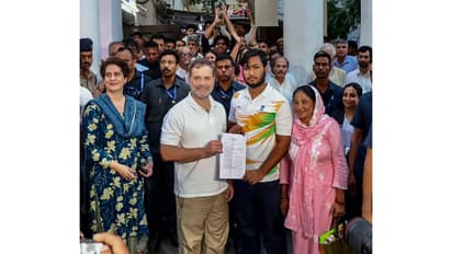 Rahul Gandhi with pellet gun shelling victim Sahil Lochav (Photo/ANI)