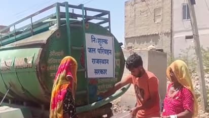 Residents in Jaisalmer taking water from PHED deployed tankers in Jaisalmer (Photo/ANI)