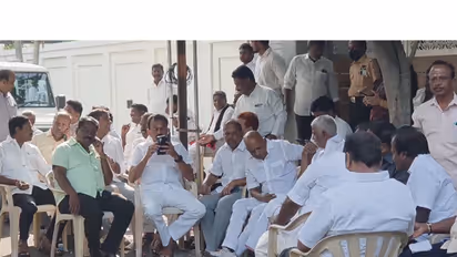 DMK cadres gathered outside former DMK minister K N Nehru's residence (Photo/ANI)