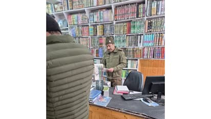 Srinagar Police conducting searches (Photo/ANI)