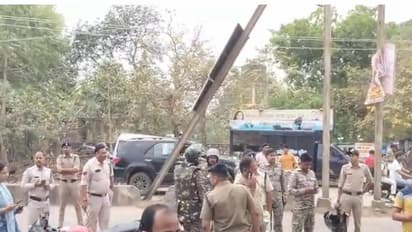 Police force present outside Morena district hospital where post mortem of forest guard is being conducted (Photo/ANI)
