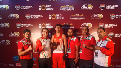 Mausam (U-19) celebrates his QF win with coaches at Asian U-19 & U-23 Boxing Chamipionship 2026. (Photo/BFI)