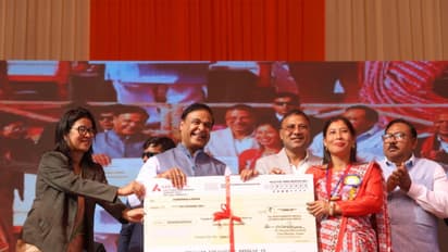 Assam CM Hemant Biswa Sarma hands over cheques under MMUA (Photo/ANI)