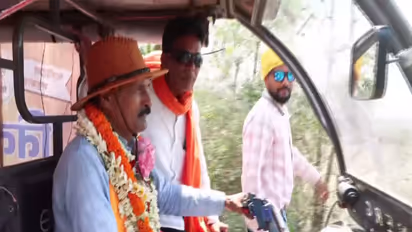 BJP candidate Niladri Shekhar Dana from Bankura constituency campaigns in E-rickshaw (Photo/ANI