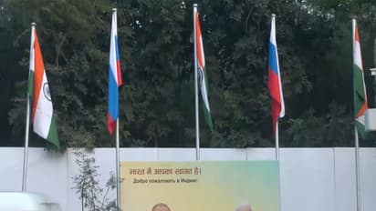 Flex boards welcoming Russian President Vladimir Putin and Russian national flags put up outside ITC Maurya (Photo/ANI)