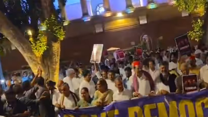 INDIA Bloc MPs march from Parliament (Photo/ANI)