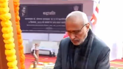 Vice President CP Radhakrishnan pays tribute to Dr. B.R. Ambedkar on his death anniversary, at the Parliament. (Photo/ANI)