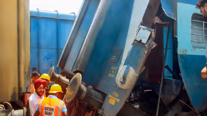 Railway workers inspect the damaged coach of a Katra-bound special train at Ludhiana (File Photo/ANI)