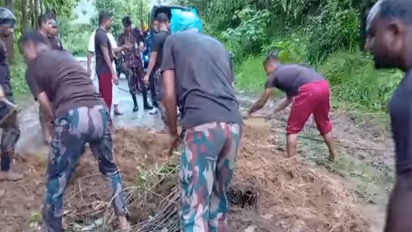 Members of the Border Guard Bangladesh (BGB) have stepped in to restore the communication and transport networks shattered by recent flash floods and devastating landslides in Bandarban (Photo/BGB)
