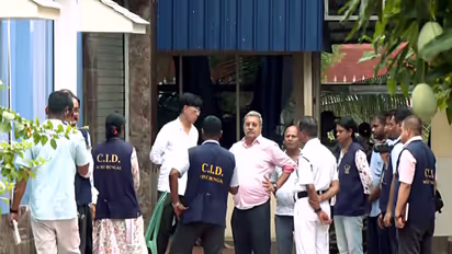 West Bengal CID at TMC supremo Mamata Banerjee's residence (Photo/ANI)