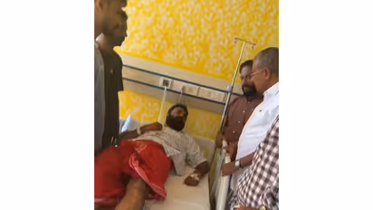 Pinarayi Vijayan meets SFI leader Sanjeev (Photo/ANI)