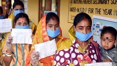 A file photo of people queuing up outside a polling station during 2021 ssembly polls in Assam. (Photo/ANI)