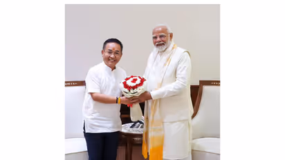 Prime Minister Modi with Sikkim Chief Minister Prem Singh Tamang (Photo/SikkimCMO)