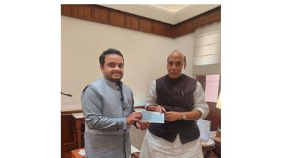 RS MP Vijay Chintakayala with Raksha Mantri Rajnath Singh (Photo/@vijaychinthak)