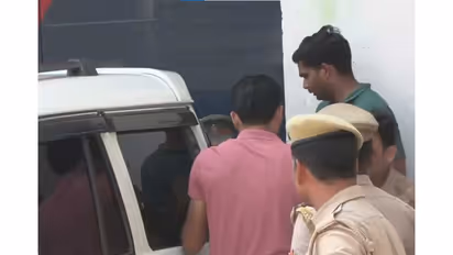 Police takes Avinash Shukla from Ayodhya District Jail (Photo/ANI)