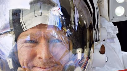 Tim Peake breaks marathon record in space