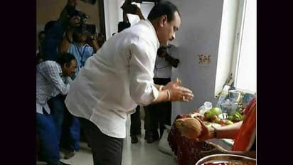 ఎక్స్ ప్రెస్ న్యూస్ : బూట్లతో పూజ చేస్తున్న ఏపి మంత్రి అచ్చెన్న