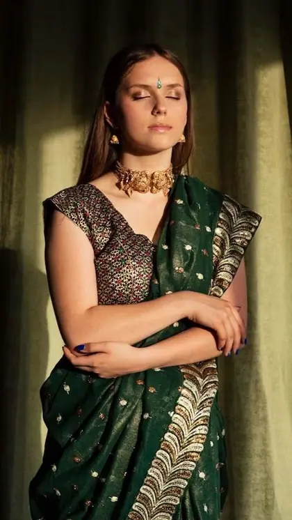 Step 3: Tuck in the Saree: