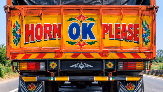 HORN OK PLEASE : లారీల వెనక 'OK' అని ఎందుకు రాస్తారు? దీని అర్థం 'సరే' కాదు, మరేంటో తెలుసా?