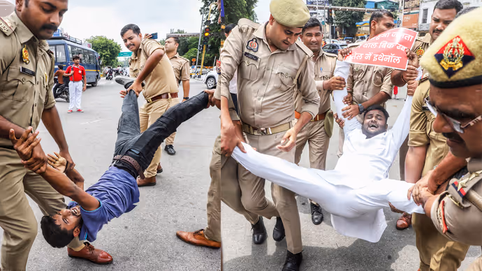 लखनऊ में बवाल: सड़क पर उतरे सपा कार्यकर्ताओं को पुलिस ने घसीटा, 7 फोटो में देखें E20 पेट्रोल का विरोध