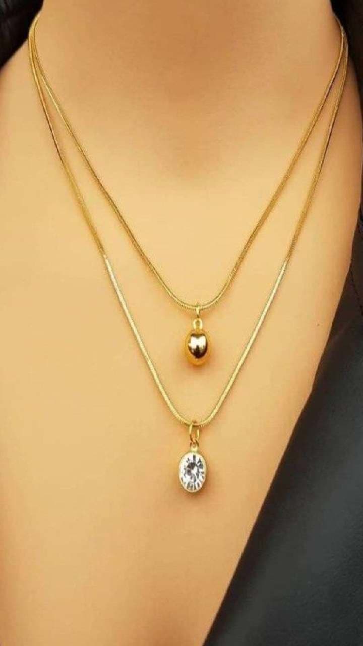 தங்க இரட்டைச் சங்கிலி: உங்கள் உடைக்கு கவர்ச்சி சேர்க்கும் புதிய ஸ்ட...