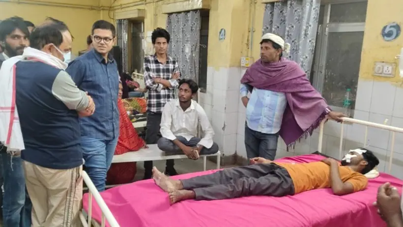 Administrative officer inquiring about the condition of a youth injured in an accident in Rajasthan