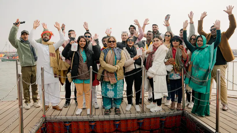 International delegates take a dip at Triveni Sangam at prayagraj mahakumbh 2025